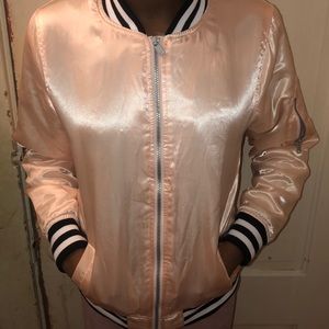 I am selling a kids blush pink bomber jacket